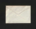 White envelop on black background - letter from editor at lake norman record