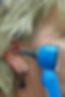 ear examination tool and a person's face