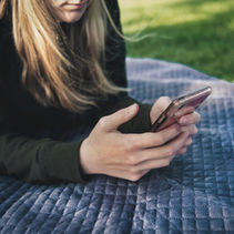 holding mobile phone