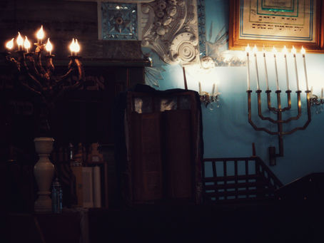 Synagogue interior with menorah candelabra