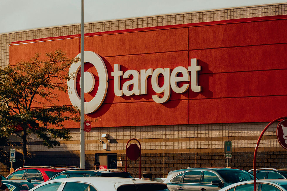 Image of exterior Target store. Cars in the parking lot.