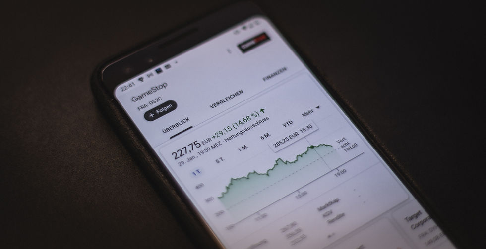 Smartphone displaying a stock market chart in an investing app