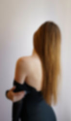 Girl with bare back and black dress