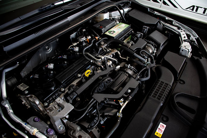 Detailed engine bay cleaning as part of West Newton North car detailing add-on services.