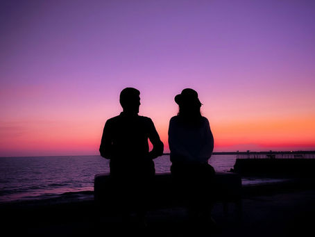 A couple watching a sunset