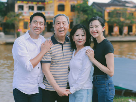 A family smiling at the camera
