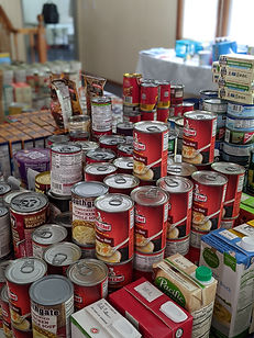 muted background of canned food items