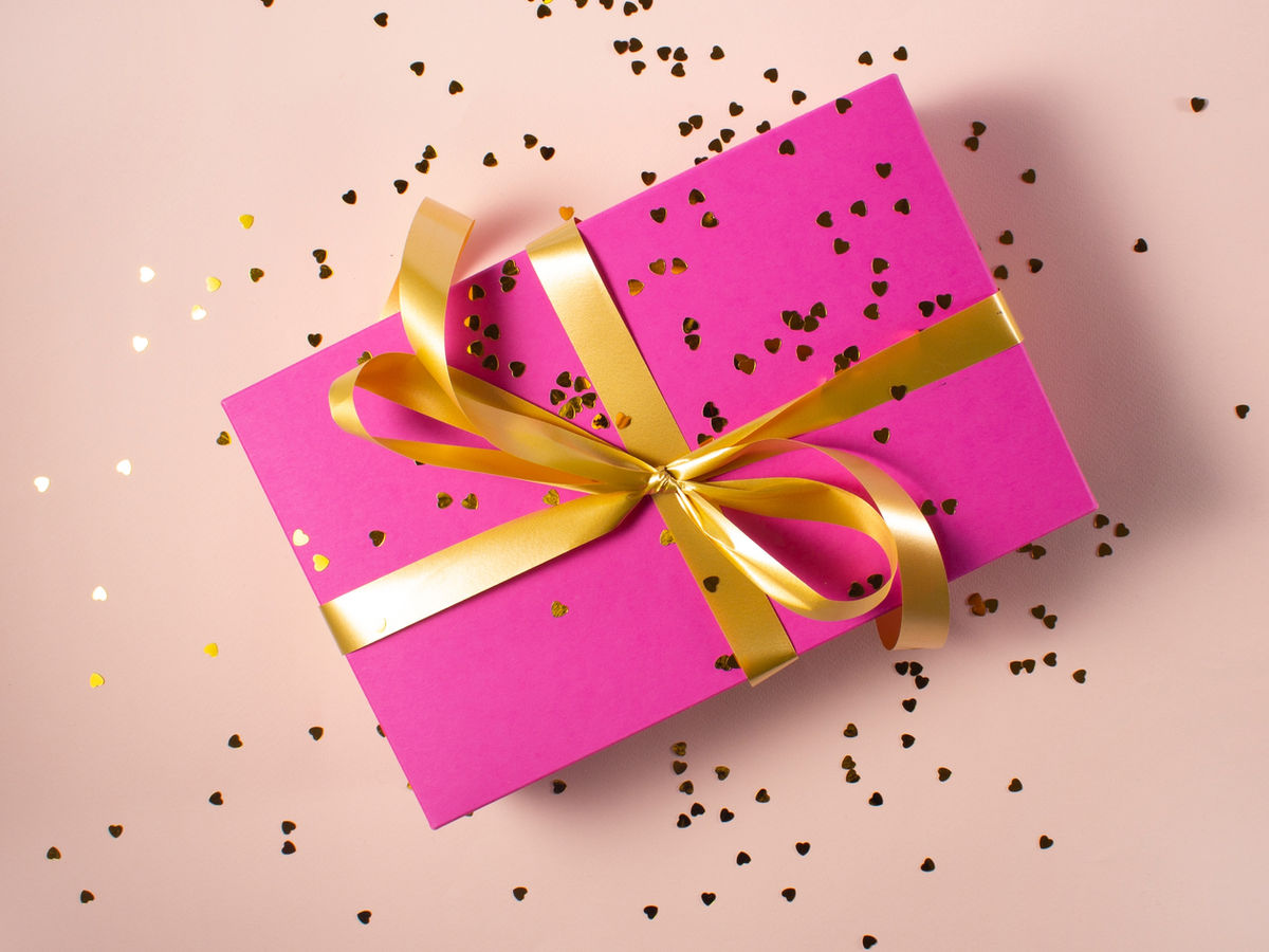 pink gift box with yellow ribbon.jpg