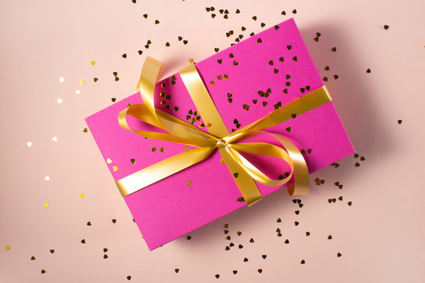 pink gift box with yellow ribbon.jpg