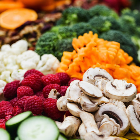 Nutritionist showing a food plan to a client during a consultation session