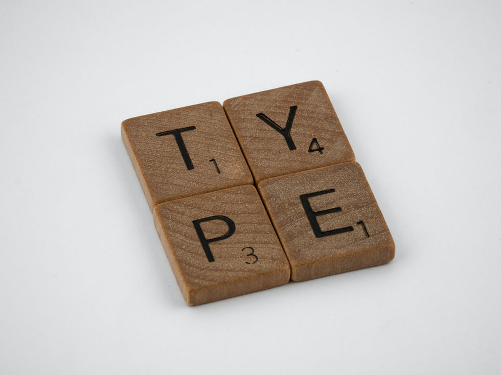 Scrabble tiles spelling out the word "type."
