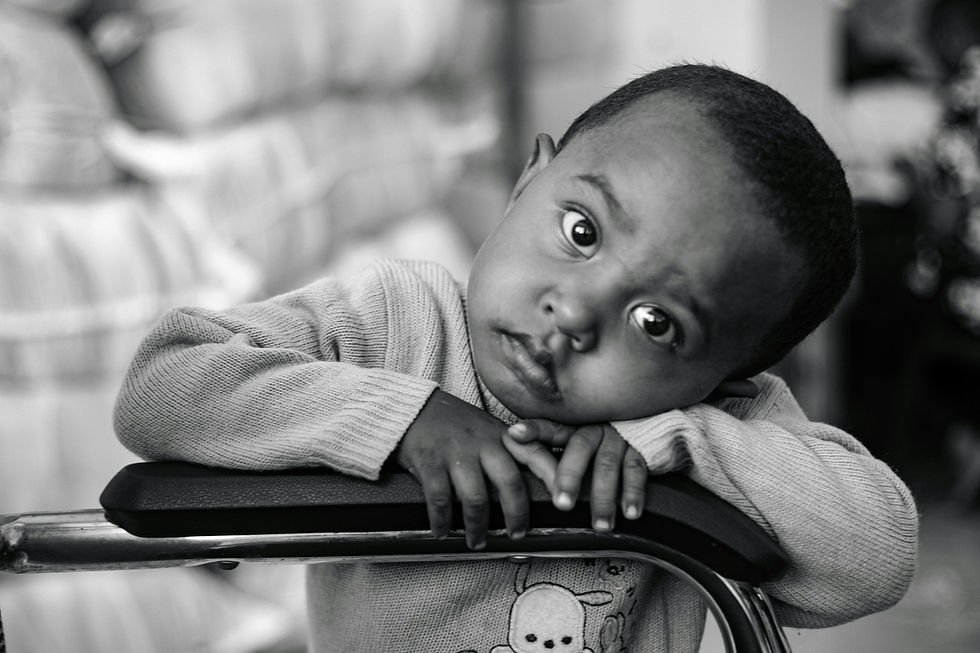 Little boy looking straight ahead
