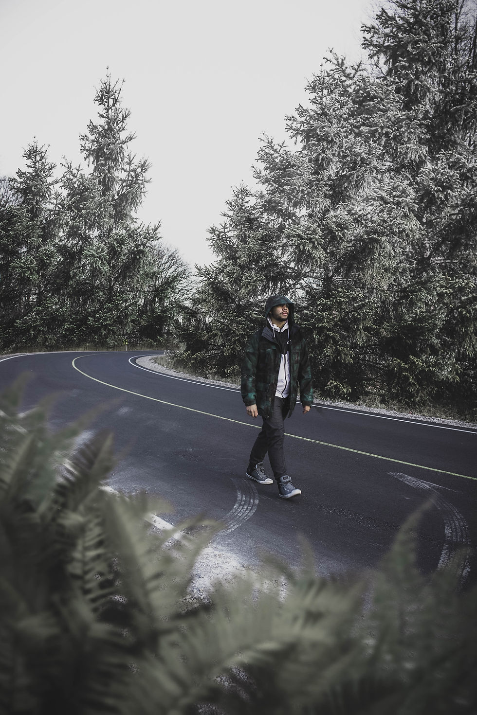 a man waking on a road