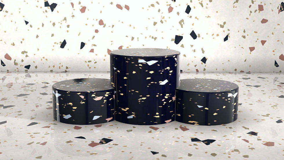 Three black cylinders with terrazzo pattern stand on a speckled surface. The background mirrors this pattern, creating a cohesive look.