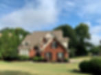 Newly Roofed house With Brown Shingles