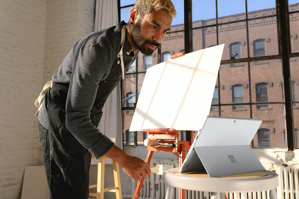 A person looking at a laptop