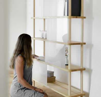 Woman by Shelves