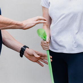 A physiotherapist helping a patient regain mobility following a car accident.
