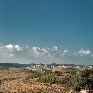 The dramatic rolling hills of the Judean Desert as seen from the eastern ridge of the Mount of Olives.