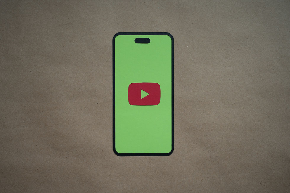 Illustration of a smartphone on a brown background, featuring a green screen with a red play button symbol, resembling a video app.