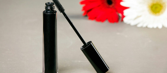 Black mascara tube and wand