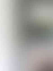 Modern farmhouse board and batten fireplace with wood mantle