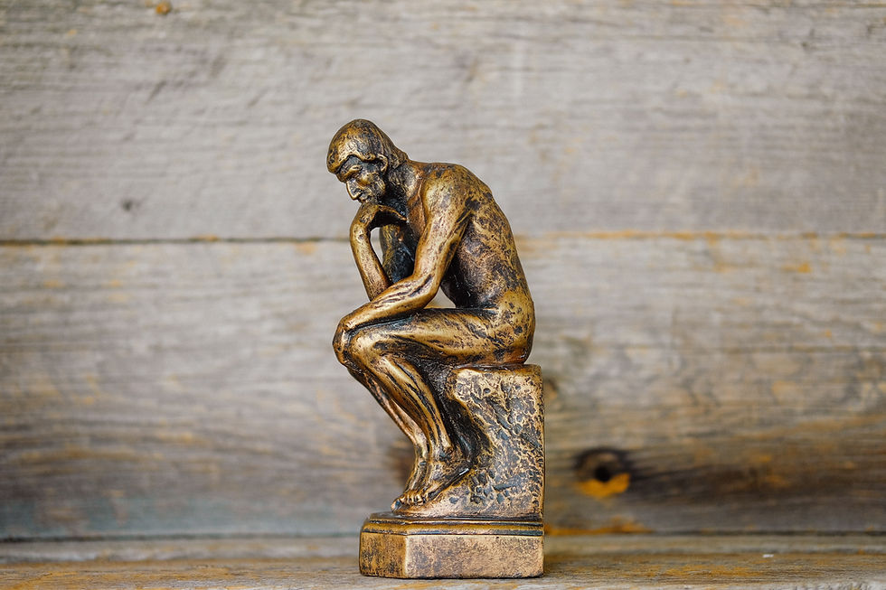 statue thinking, gold