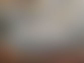 Woman walking through sunlit autumn forest — representing the mood-lifting, brain-boosting benefits of daily aerobic exercise for perimenopause brain fog relief