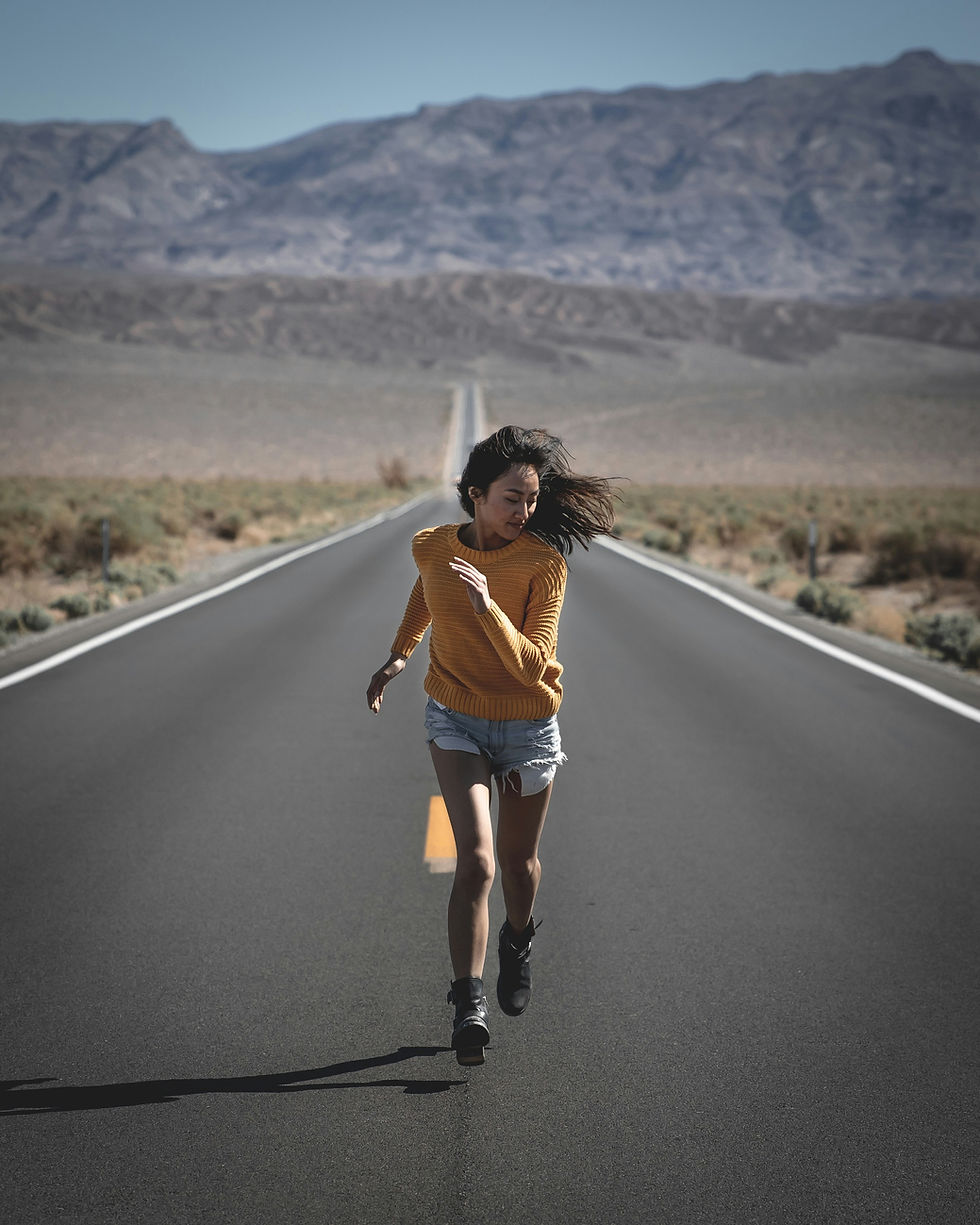Woman running in a road