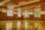High-level inspection of wooden sports hall flooring in Cornwall