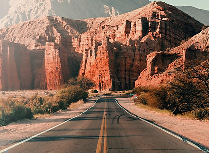 This itinerary through Argentina’s northwest is a relaxed journey that blends Andean landscapes with wine culture, colonial towns, and striking desert scenery. It begins in the region around Salta, where time is spent exploring a city known for its well-preserved architecture, lively plazas, and strong regional identity shaped by Indigenous and Spanish influences. From here, travel moves into the surrounding valleys, where vineyard-covered hillsides sit beneath dramatic mountain backdrops.
The focus gradually shifts into higher and more arid terrain as the route continues through areas such as the Calchaquí Valleys. Here, the landscape becomes increasingly sculpted, with colourful rock formations, wide open desert expanses, and small rural settlements that reflect traditional ways of life. Wine production remains a central thread throughout the journey, with visits to boutique wineries that specialise in high-altitude varietals, offering a sense of how geography directly shapes local production.
The itinerary balances cultural exploration with scenic travel, allowing time in both towns and remote landscapes without rushing between locations. Overall, it presents a measured introduction to a lesser-visited corner of Argentina, where wine, geology, and heritage come together in a distinctive and coherent travel experience.