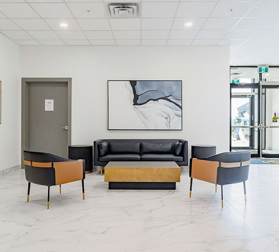 office entry waith metal door, furniture, and storefront doors