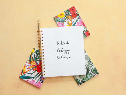 be kind be happy be brave written in notebook