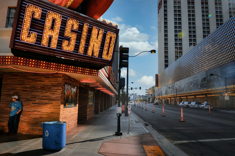 Person walking away from a casino while holding a Bible, representing freedom from gambling addiction through faith in Jesus Christ.