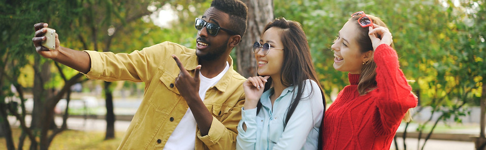 friends taking a selfie after exploring therapy for self-esteem
