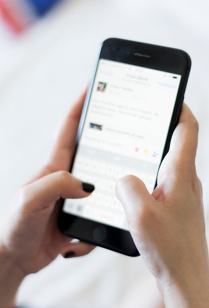 Hand ordering food delivery on an app