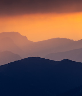 Sunset over mountains. Image by Marek Piwnicki