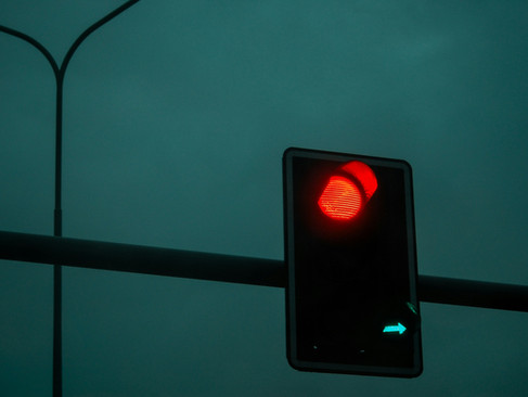 Red light representing hesitation and the mental stop signals caused by fear-based anxiety