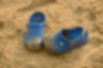 Crocs shows on the beach