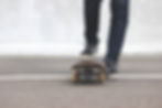 legs on a skateboard