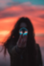 Woman Holding Reflective Sphere