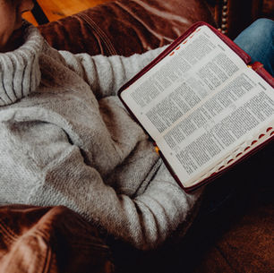 bible reading on sofa