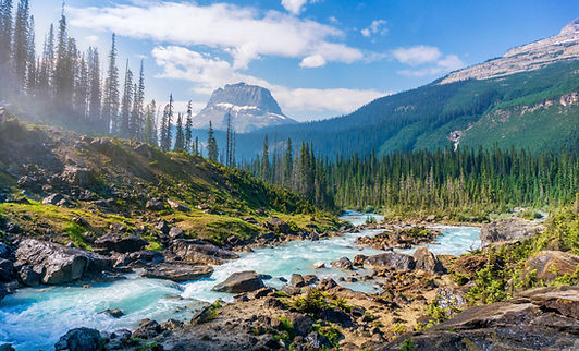 River running through mountains.