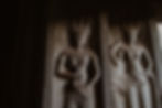 Intricate stone carvings of Apsaras at Angkor Wat temple