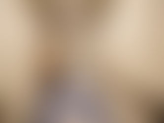 Long empty corridor on a cruise ship, representing the extended pace and shifting atmosphere of longer ocean voyages.