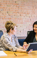 Two women talking to each other
