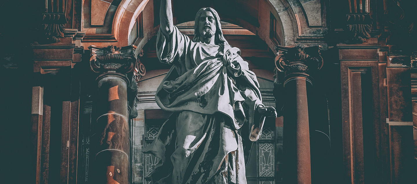 Armoured messianic figure standing in shadowed light, representing the triumphant return of divine authority