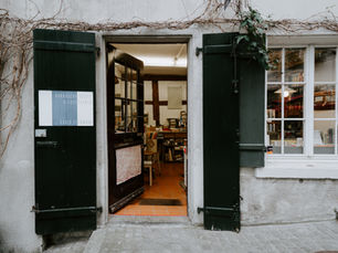 An office with their double doors are open.