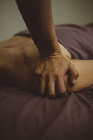 A person receiving a back massage