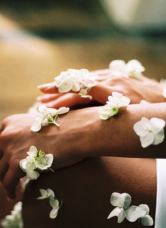 Flowers on outstretched arms